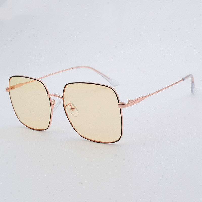 Gold lense sunglasses