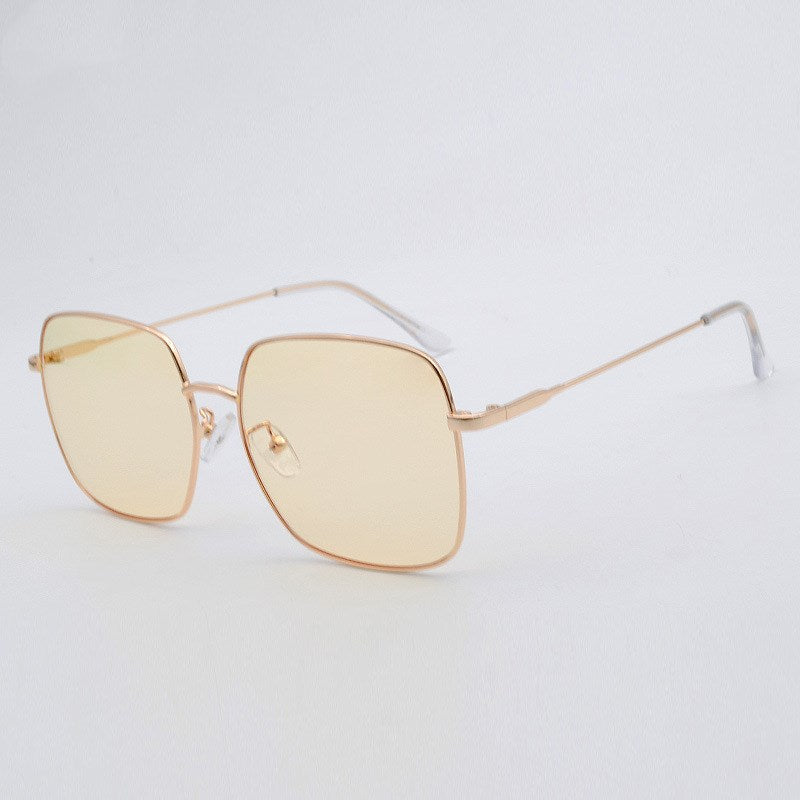 Gold lense sunglasses